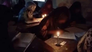 পরীক্ষার্থীরা মোমবাতির আলোয় এসএসসি পরীক্ষা দিচ্ছেন